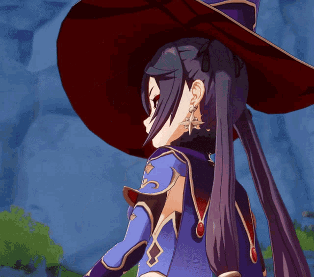 Mona Megistus flicking her hair back and acting smug to the camera.